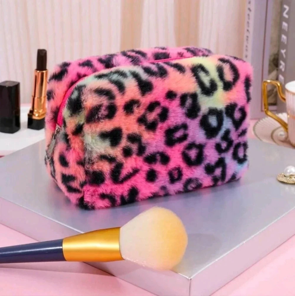 Small ladies pink rainbow leopard print bright colored makeup bag travel size